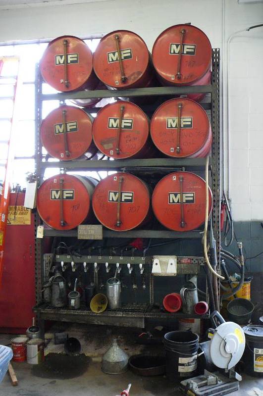 Large Oil Rack With 9 - 50 Gallon Drums & 9 Oil Dispensers