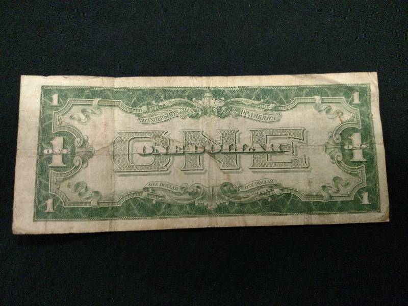 1928 A Funny Back One Dollar Silver...