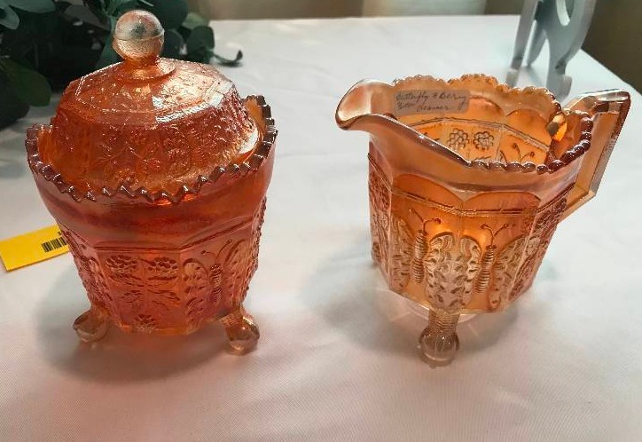 lot 185 image: Fenton 1911 butterfly and Berry sugar and creamer marigold