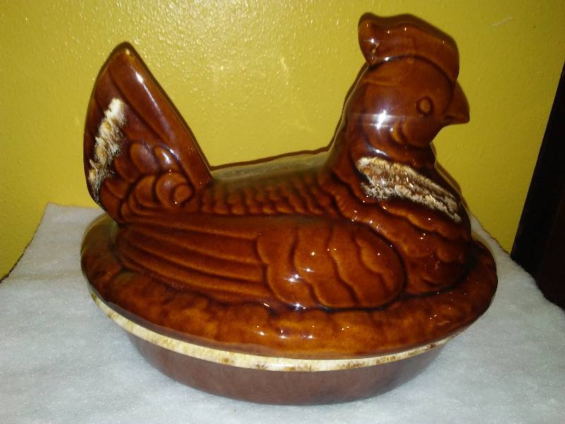 lot 372 image: HULL Pottery Hen on Nest Brown Drip Covered Casserole