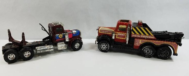 lot 17 image: Lot of two toy trucks by ERTL and Buddy L Corp Made in Japan 1981