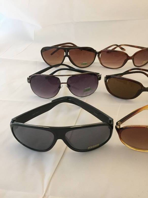 lot 509 image: Sunglasses - New - 9 Pair