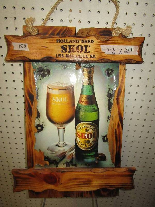 lot 24 image: Skol Holland Beer J.W.S Beer Co. L.l. N.Y. Wood Sign