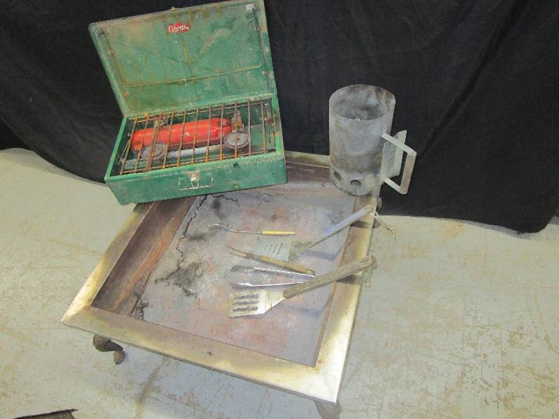 lot 150 image: Fire Pit with Cast Iron Legs , Charcoal Starter and Coleman Stove