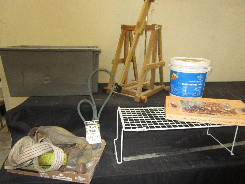lot 166 image: Straps, White Tailed deer Trivia Game, Chlorine Tabs, and a Catapult