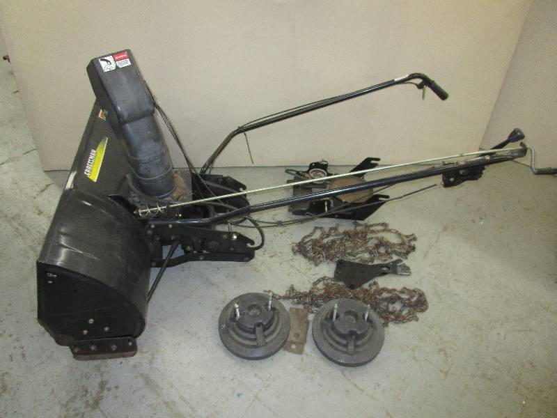 lot 205 image: Craftsman 42 Snowblower came off of Lot 204 Mower. Wheel weights, Chains and all blower parts included.