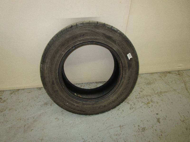 lot 215 image: 215 65 R16 Good Year tire (Good Tread)