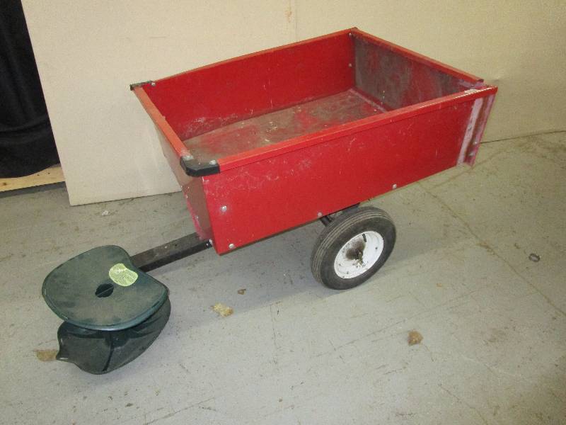 lot 217 image: Pull Behind dump utility cart