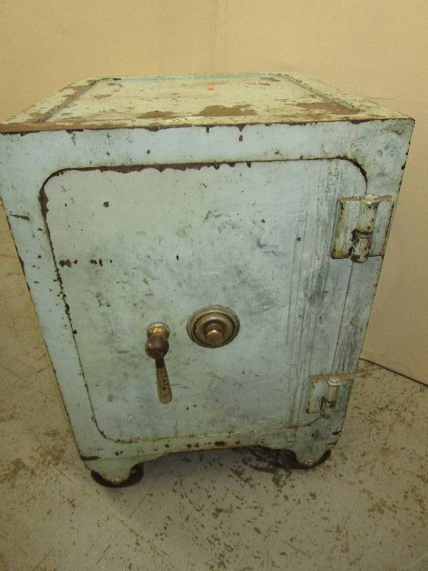 lot 230 image: Metal Safe On Steel Wheels Opens and Locks