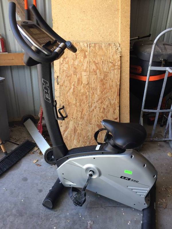 lot 10 image: Professional Physical Therapy BH Fitness LK550 Upright Exercise Bike 16 Levels Resistance - Commercial PRO Quality See PDF - Wheels Make It Easy To Move - Excellent Working Condition