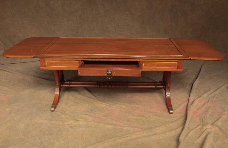 lot 28 image: Antique Drop Leaf Federal Style Coffee Table With Drawer That Has A Lion Head PullHardware & Brass Feet 