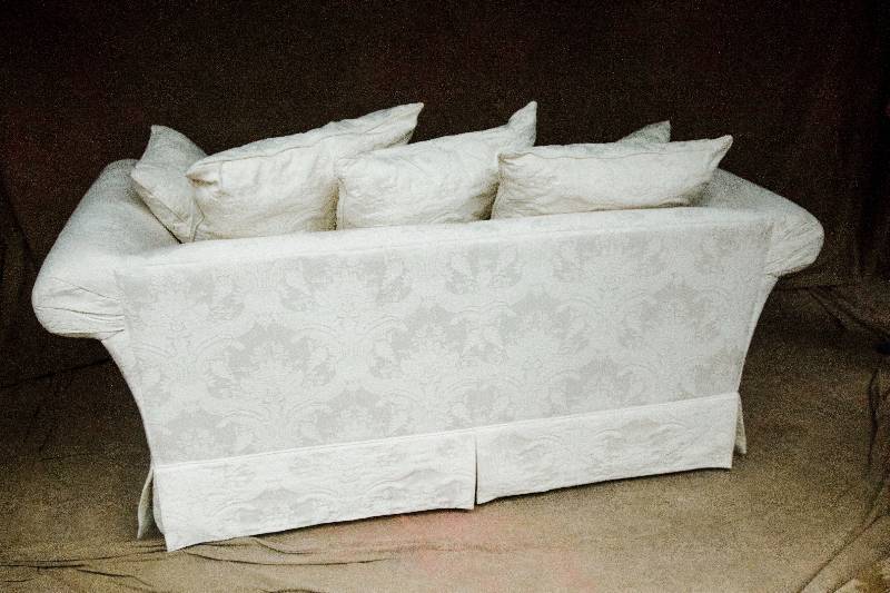 lot 19 image: Yep There Are Two  #2 Stunning High Quality Bauhaus Furniture White Champagne Brocade Loveseat With 5 Throw Pillows - Unbelievable Condition For Being White - Hard To Find Any Stains Whatsoever