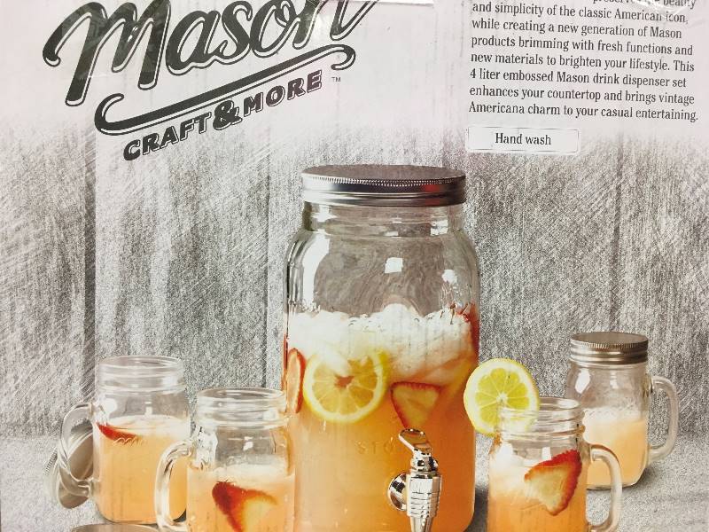 lot 99 image: Garden Terrace 3 Gal. Glass Bev Dispenser with ChillerInfuser, Water Hyacinth Stand, and 6-Glass Mason Jar Mugs 15 oz. New