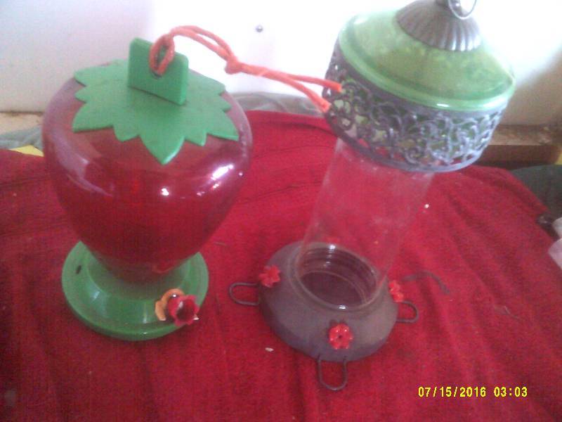 lot 62 image: 2 HUMMINGBIRD FEEDERS