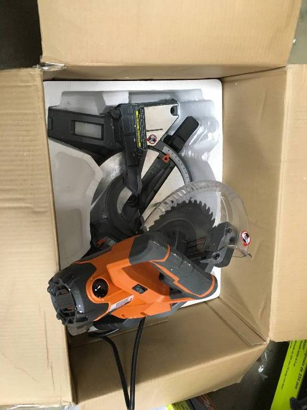 RIDGID 15 Amp 10 in. Dual Bevel Miter Saw in working conditions