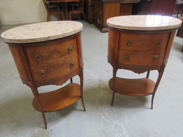 lot 109 image: WOODEN OVAL END TABLES WITH MARBLE TOPS