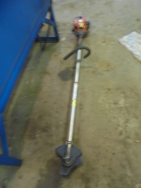 lot 17 image: Homelite Brush Cutter