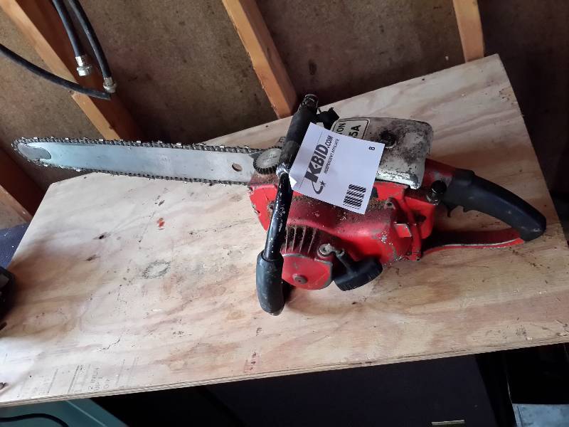 lot 8 image: Remington PL-55A Chainsaw
