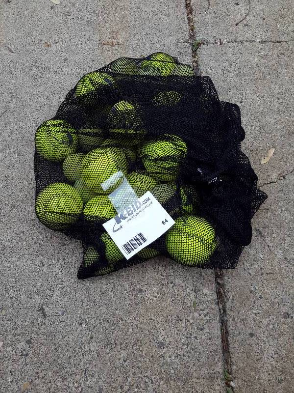 lot 64 image: Softballs and Tennisballs