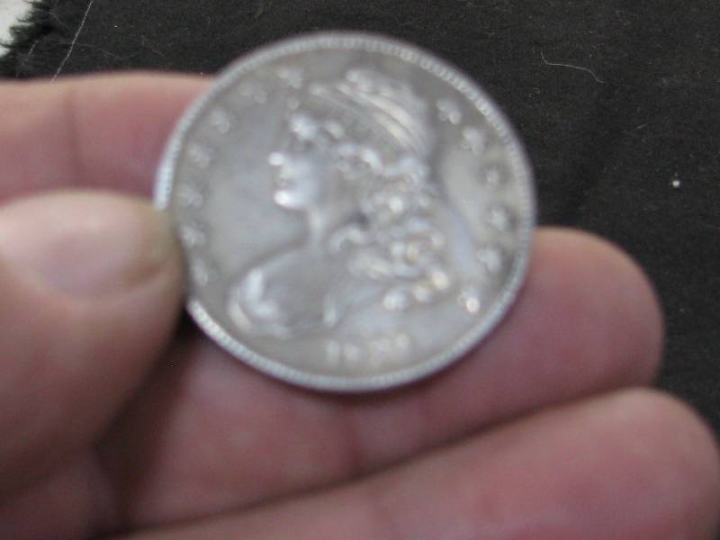 lot 39 image: 1834 Liberty Capped 50 Cent Piece