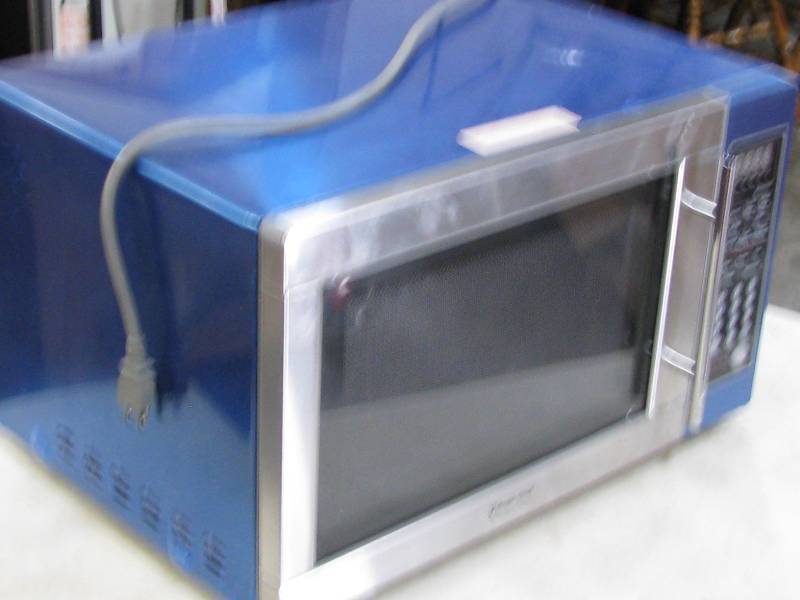 lot 57 image: Magic Chef Microwave