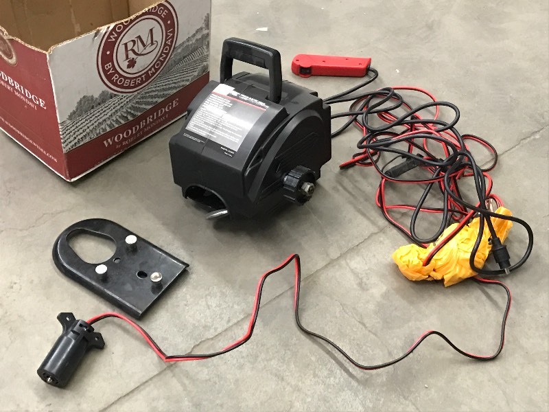 lot 28 image: Xtreme Garage 12Volt Electric Winch...