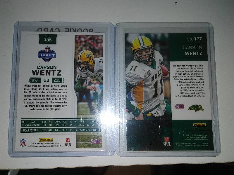 lot 39 image: 2 Carson Wentz rookie cards, Panini rookie and score RC and protective hard sleeves
