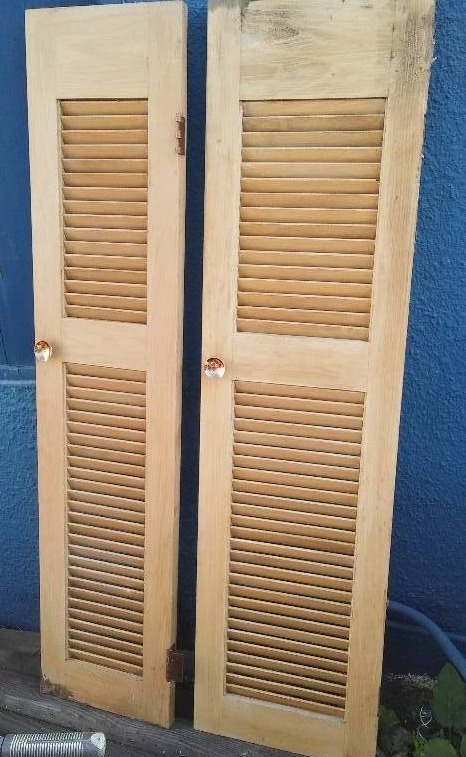 lot 48 image: 2 louvered doors 68 x18 and 68 x 15