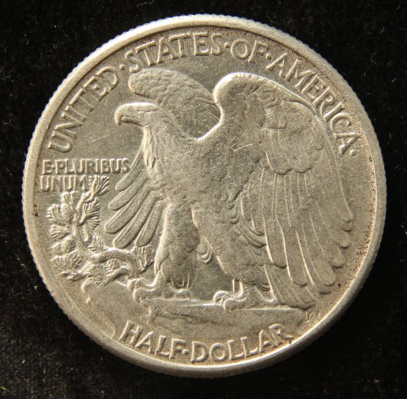 1942 WALKING LIBERTY SILVER HALF DOLLAR IN HIGH GRADE