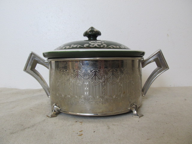 lot 139 image: Antique Royal Rochester Baking Dish w Arts & Crafts Period Silverplated Holder