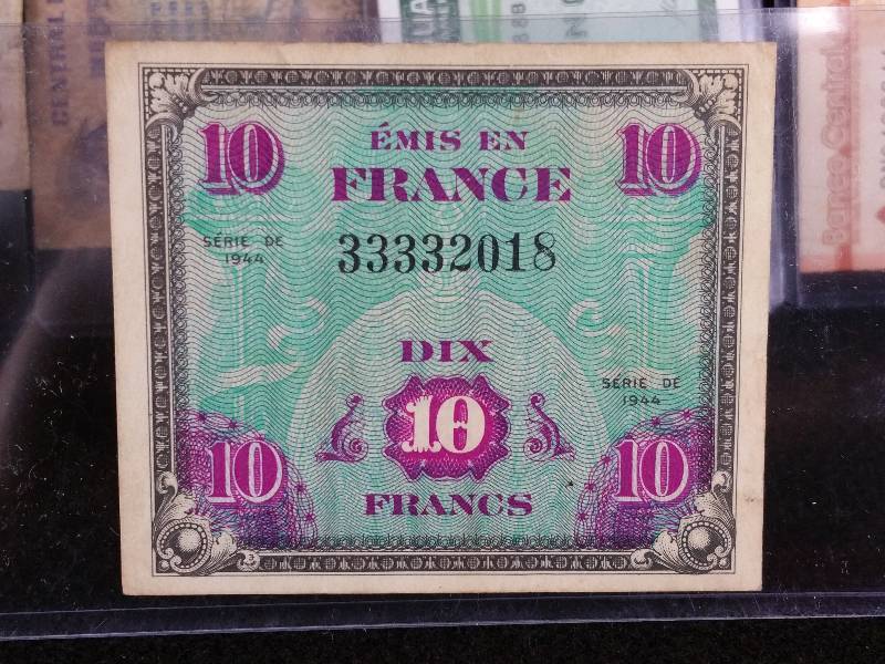 lot 99 image: Foreign Coins & Currency