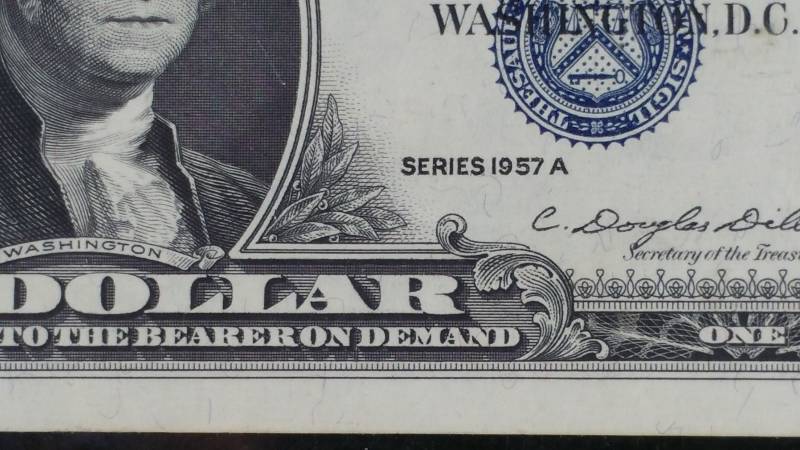lot 105 image: 1957 B $1 Blue Seal Silver Certificate - Better Grade
