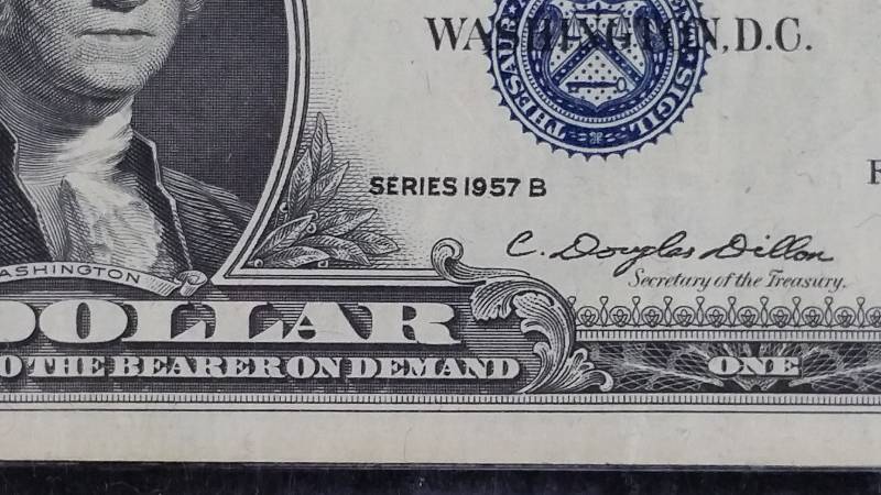 lot 106 image: 1957 B $1 Blue Seal Silver Certificate - Better Grade