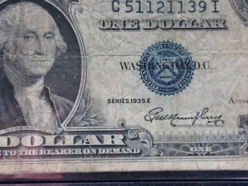 lot 108 image: 1935 E $1 Blue Seal Silver Certificate  1957 A $1 Blue Seal Silver Certificate