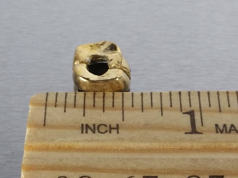 lot 113 image: Gold Tooth
