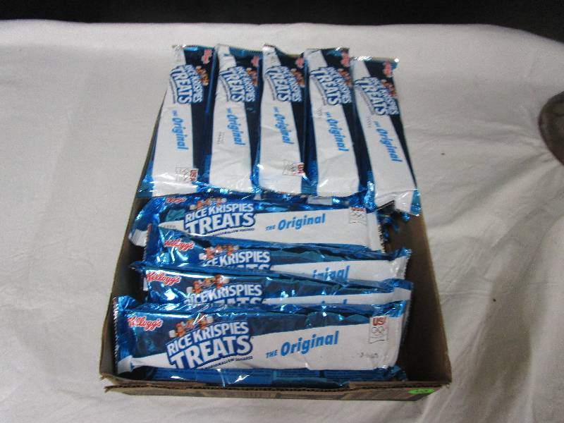 lot 18 image: 25 Rice krispies Treats the orginal, 2 buttery toffee Rice Krispies treats , 2 M&M, 3 double chocolatey Chunk
