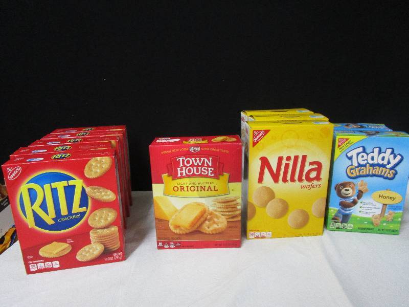 lot 23 image: 5 Boxes Of Ritz Crackers, 2 Boxes of Teddy Grahams, 1 Original Toll House and 3 Nilla Wafers
