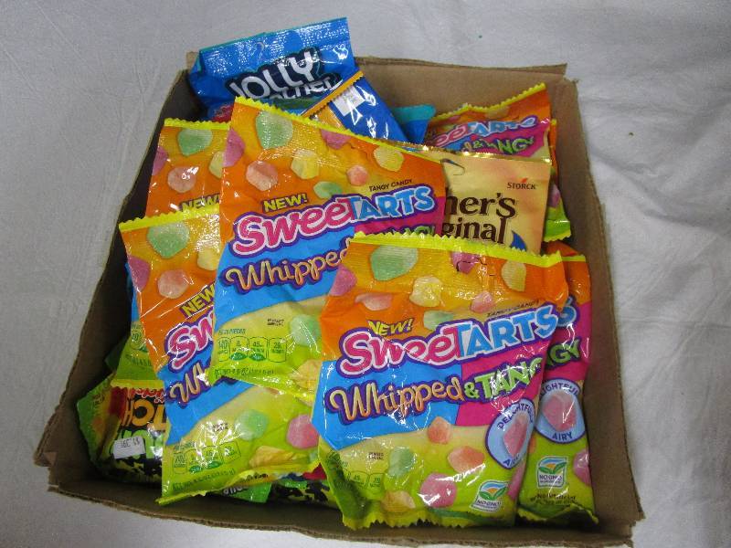 lot 41 image: 30 assortment of chewy caramels, jolly rancher chews, sour patch kids, etc.