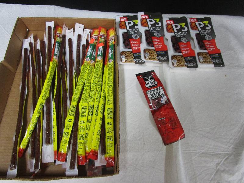 lot 46 image: 1 peppered beef steak, 4 P3 portable protein pack, 27 tabasco slim jims