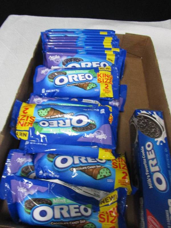 lot 70 image: 10 Chocolate candy Bars, 14 Mint King Size and 1 Box of Oreos