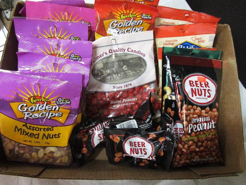 lot 76 image: 7 mixed nuts ,6 Beer nuts orginal nuts,1 burnt peanuts, 3 Almond Smokehouse.