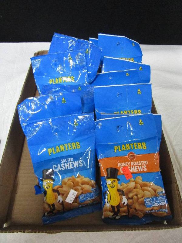 lot 80 image: 8 Planters salted cashews, 8 Hoey roasted cashews.