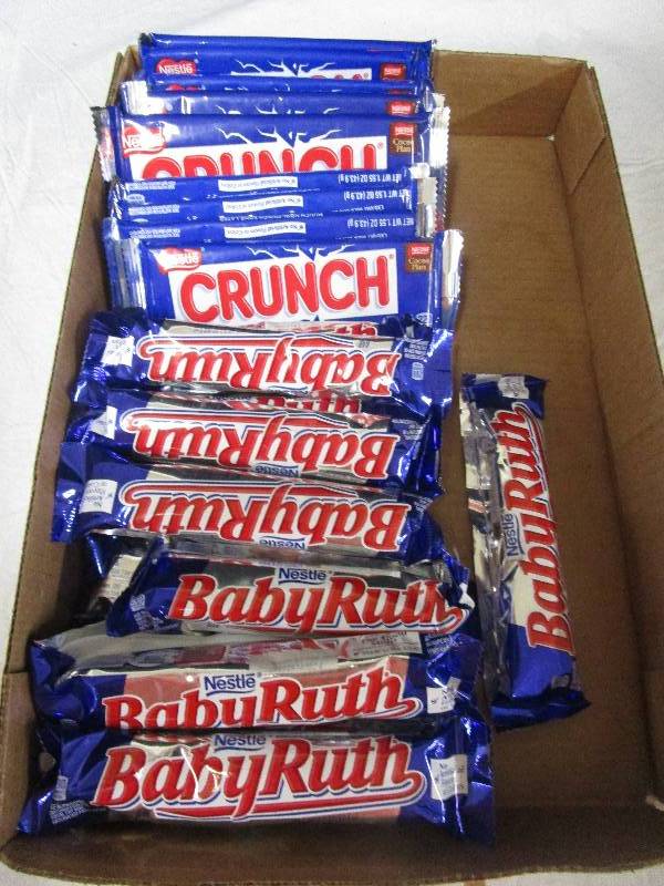 lot 89 image: 14 baby ruth bars and 11 crunch bars