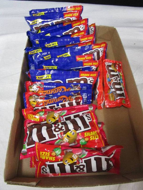 lot 115 image: assortment of 24 M&M products
