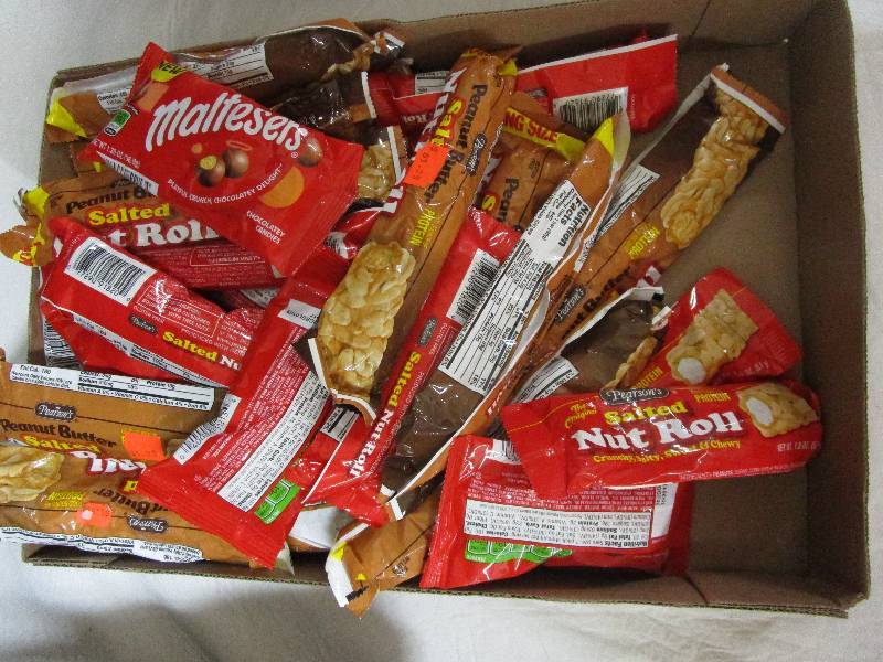 lot 153 image: 28 Nut Rolls and Maltesers