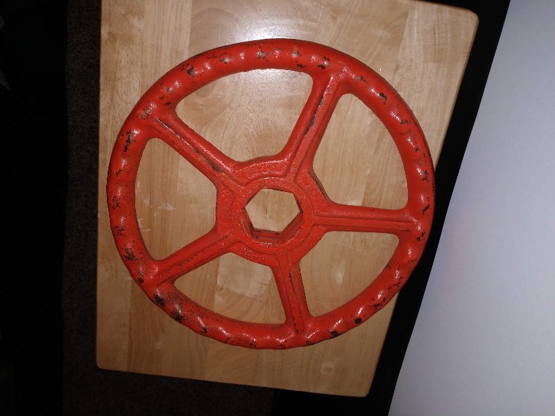 lot 11 image: Orange Stockham Gate Valve Hand Wheel 