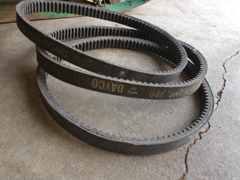 lot 44 image: Antique Snowmobile Skis and Snowmobile Belts
