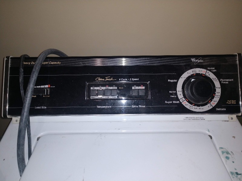 lot 49 image: Whirlpool Clean Touch Washer and Dryer