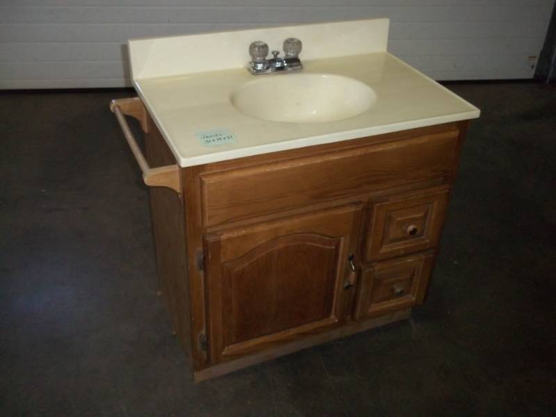 lot 35 image: Vanity with sink and faucet
