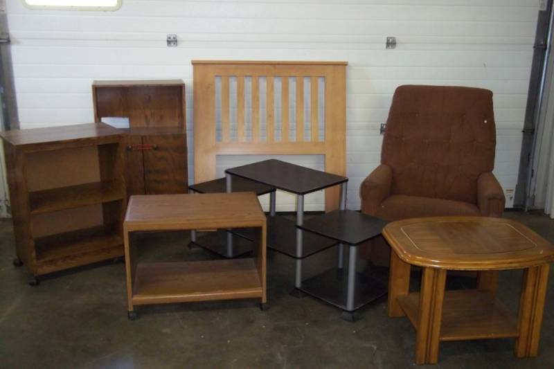 lot 36 image: Living room set with recliner, coffee table, TV stands and cabinets